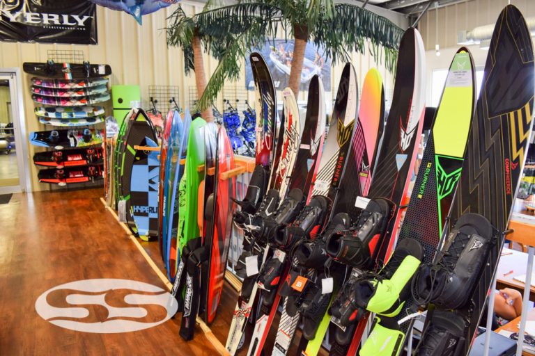 Wakeboards lined up in a store